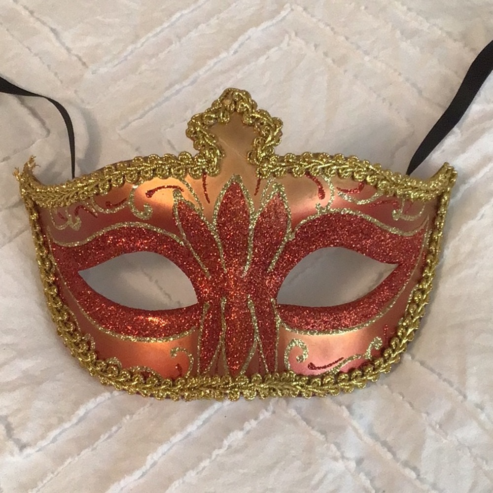 Gold and red sparkly masquerade mask